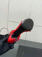 Louis Vuitton women’s red sandal sole and heel end; black underside with red border