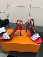 Louis Vuitton women’s red and black high-heel sandals with multicolor floral print strap detail