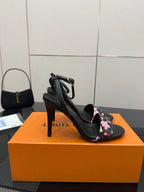 Black slingback stiletto sandals with multicolor floral monogram ankle strap