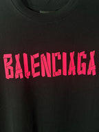 Black T-shirt with pink BALENCIAGA lettering