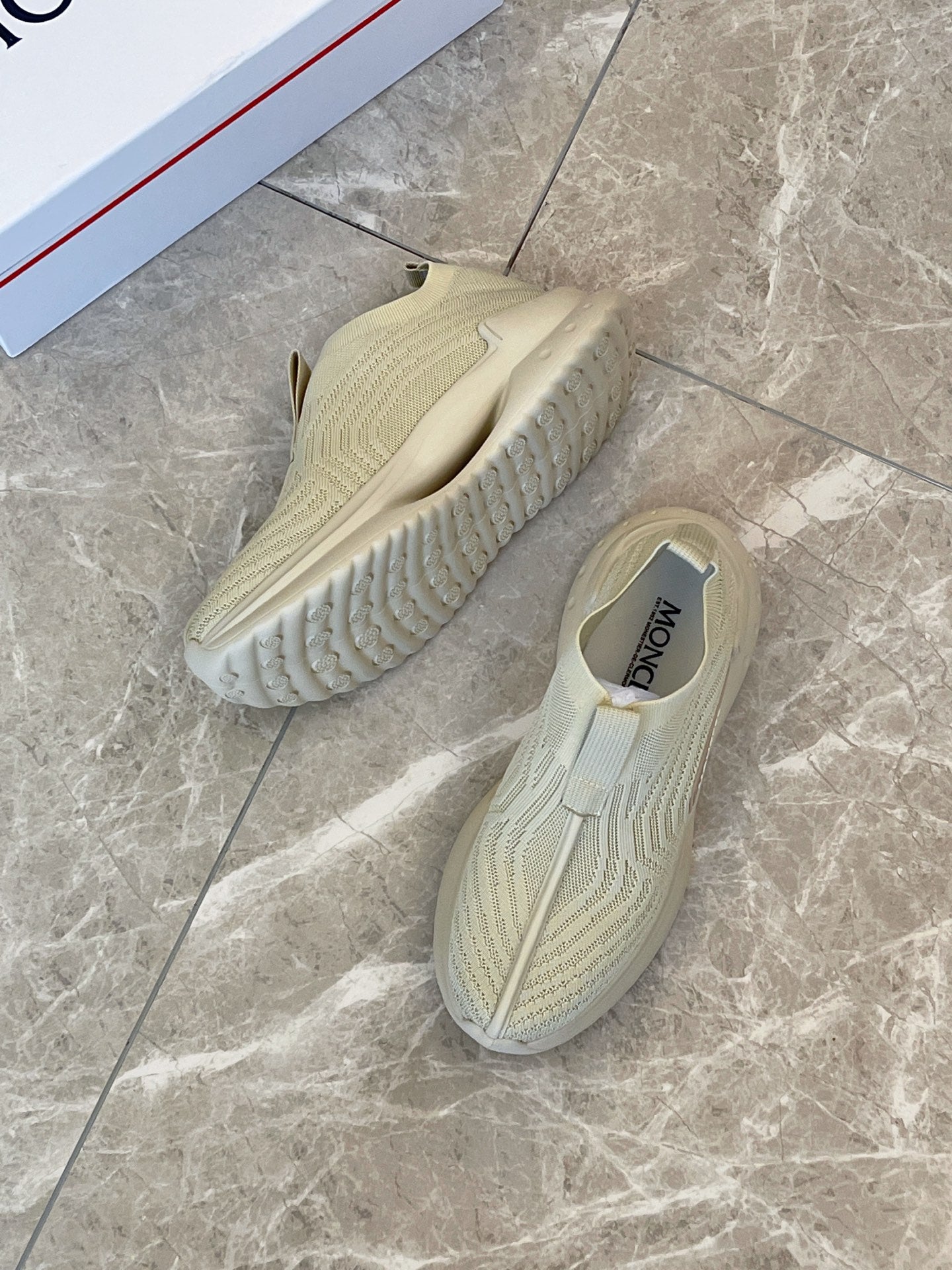 Moncler knit slip-on sneakers, light green, angled heel and side view