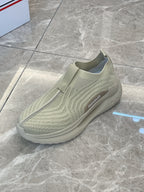 Moncler knit slip-on sneaker, light green, side profile with stitched detailing
