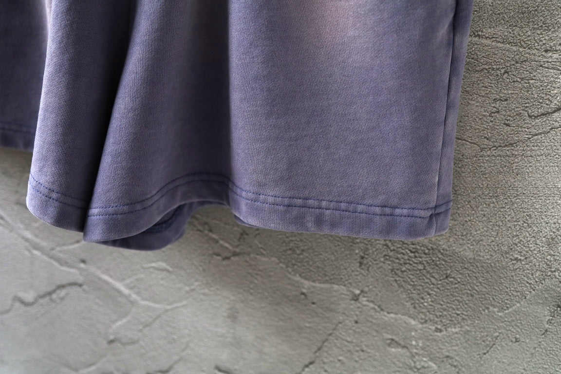 Balenciaga lavender shorts hem with relaxed drape and visible stitching