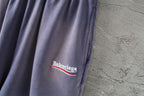 Balenciaga lavender shorts with small embroidered 'Balenciaga' logo on leg