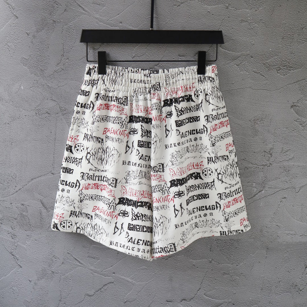 Balenciaga printed shorts with elastic waistband and drawstring, white multicolor text