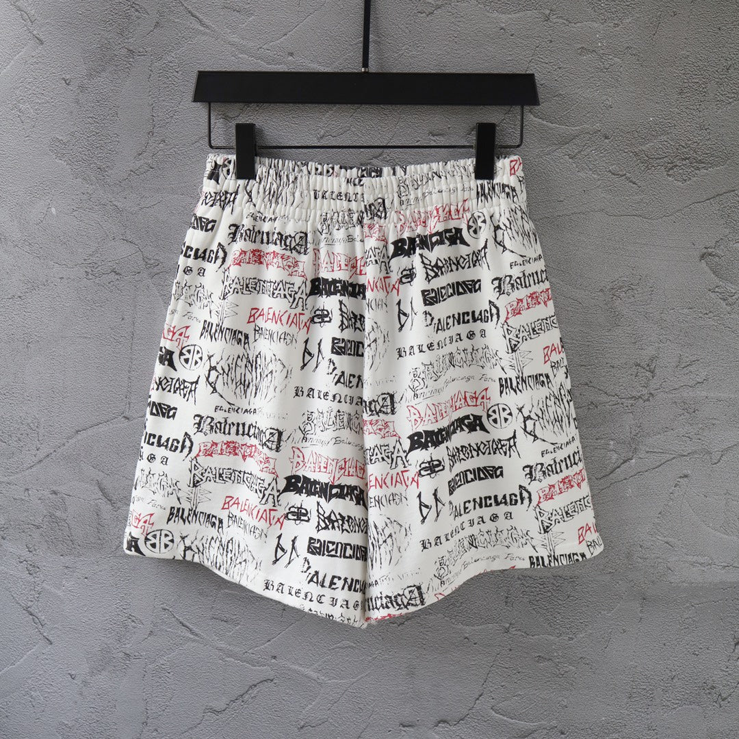 Balenciaga printed shorts with elastic waistband and drawstring, white multicolor text