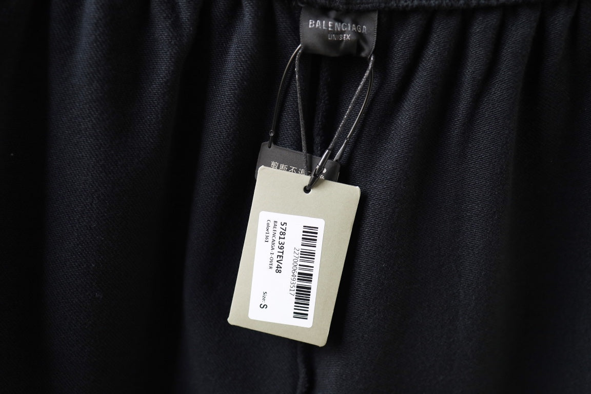 Dark navy shorts with hanging inner brand tag and barcode label
