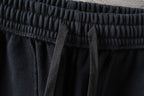 Dark navy shorts with elastic waistband and inner drawcord
