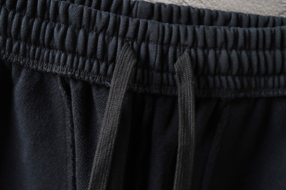 Dark navy shorts with elastic waistband and inner drawcord
