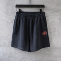 Dark navy elastic-waist shorts with side logo patch