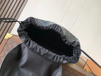 Louis Vuitton monogram backpack interior view with ruched drawstring rim