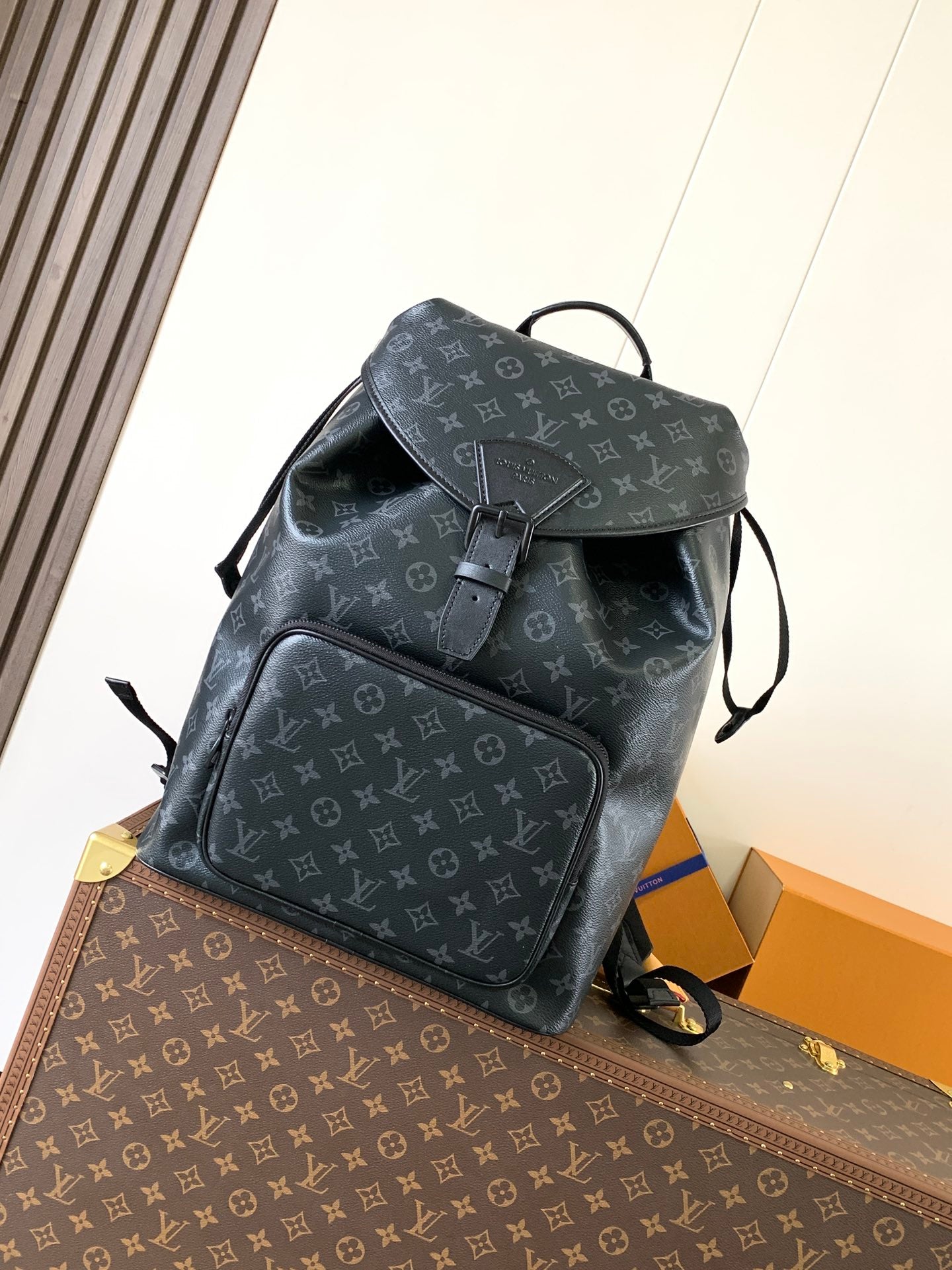 Louis Vuitton monogram backpack in dark gray with flap top and front pocket