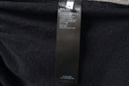 Balenciaga black shorts with interior fabric care label on seam