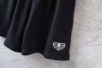 Balenciaga black shorts with white logo at side hem