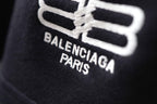 Balenciaga black shorts with large white logo and BALENCIAGA PARIS text