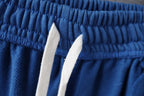 Balenciaga blue pants waistband with two white drawstring tips
