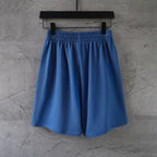 Balenciaga blue pants with elastic waist, pleated front, and wide leg shape