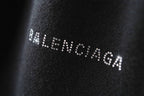 Balenciaga logo embellishment on black knit fabric