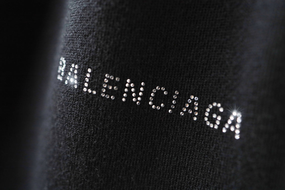 Balenciaga logo embellishment on black knit fabric