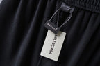 Balenciaga shorts hang tag on black waistband