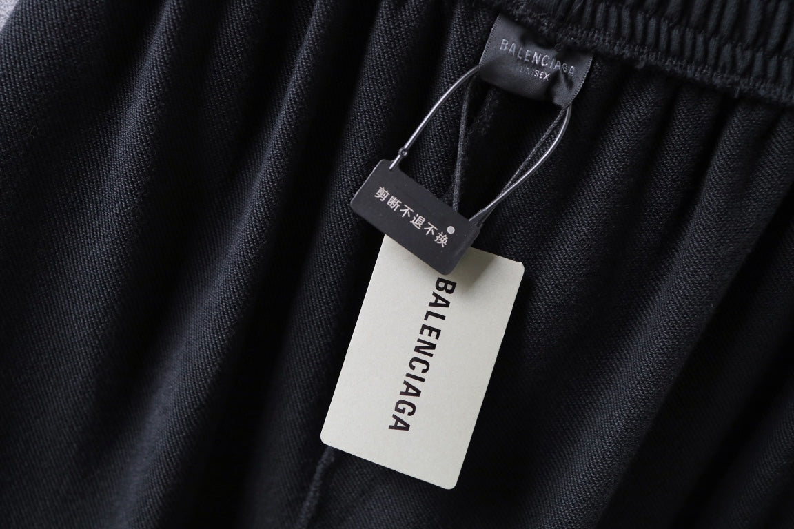 Balenciaga shorts hang tag on black waistband