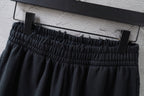 Black Balenciaga shorts waistband with elastic gathers and drawstring tabs