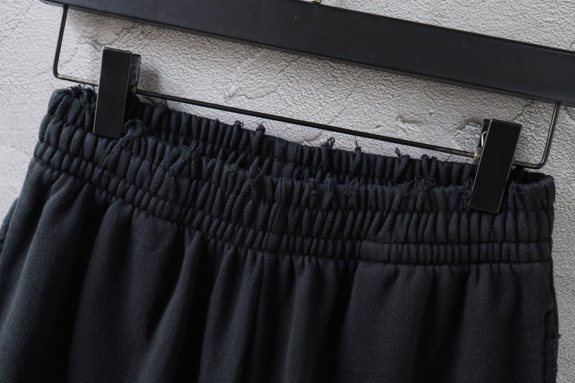Black Balenciaga shorts waistband with elastic gathers and drawstring tabs