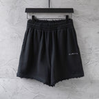 Black Balenciaga drawstring shorts with elastic waist and loose fit
