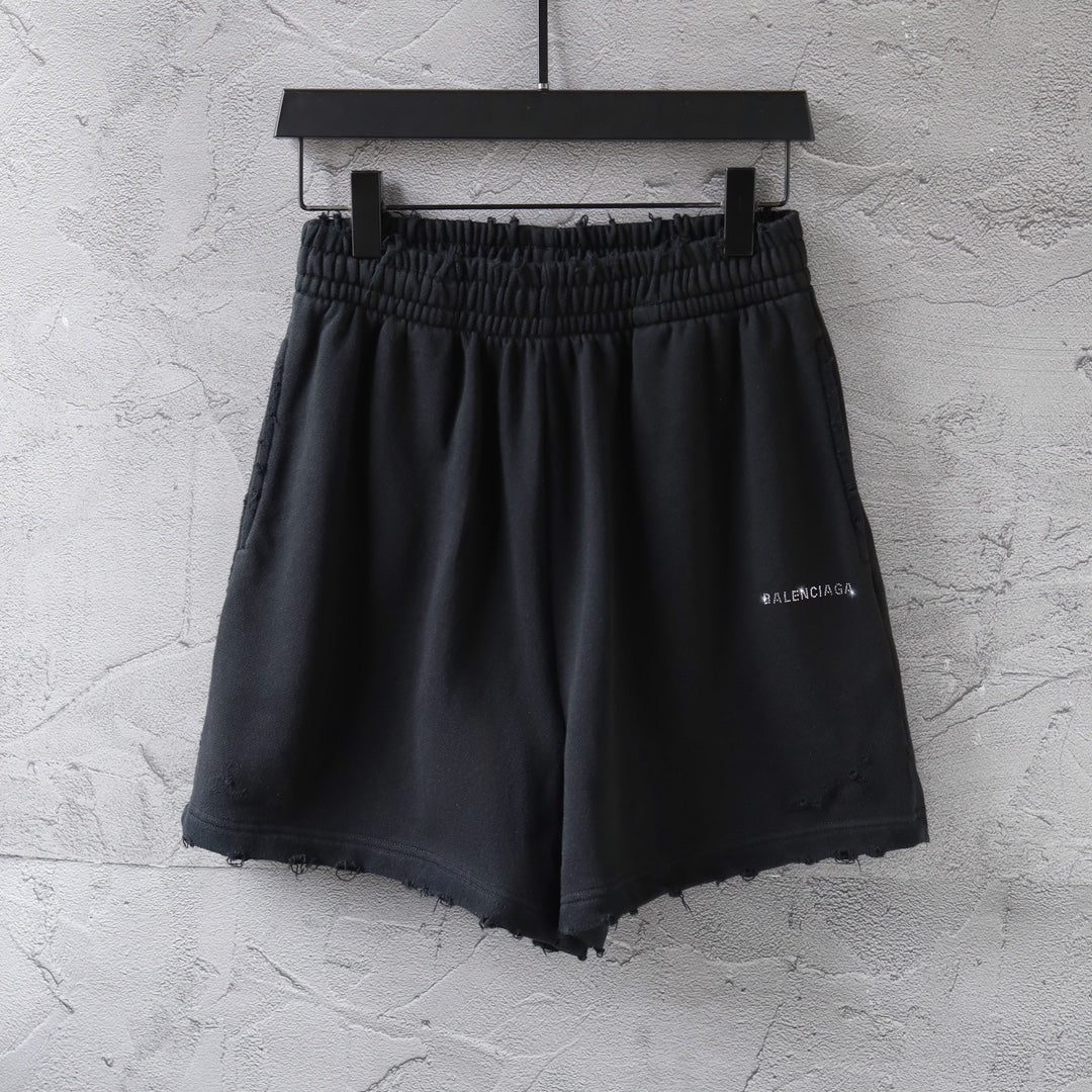 Black Balenciaga drawstring shorts with elastic waist and loose fit