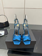 Blue strappy high-heel sandals with open toe and thin stiletto heel