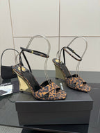 Women's high-heel sandals with leopard-print straps, clear ankle loops, wedge heel view.