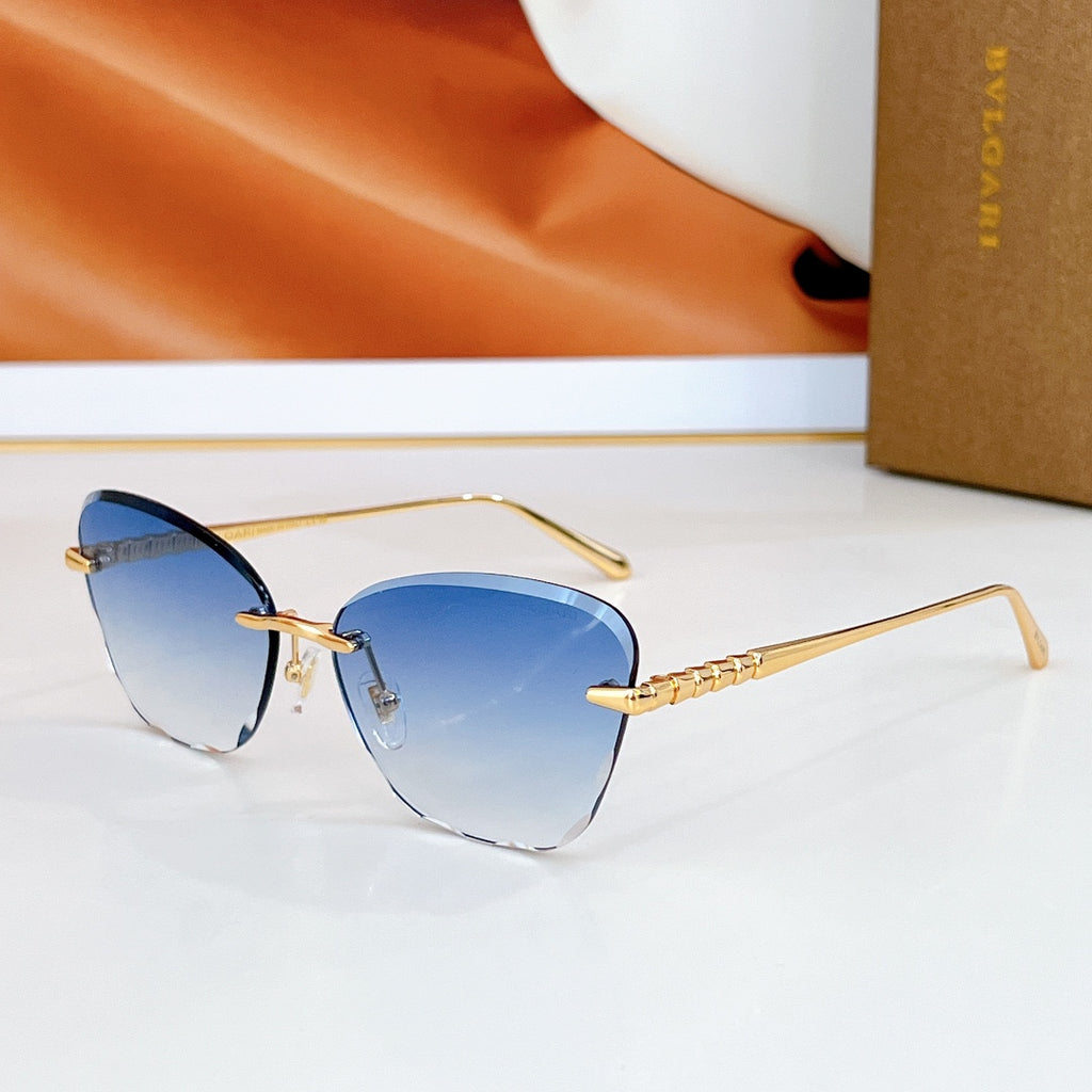 Bvlgari sunglasses with blue lenses and gold-tone metal frames.