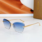 Bvlgari sunglasses with blue lenses and gold-tone metal frames.