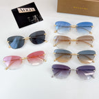 Bvlgari sunglasses set with multiple tinted lenses and gold-tone frames.