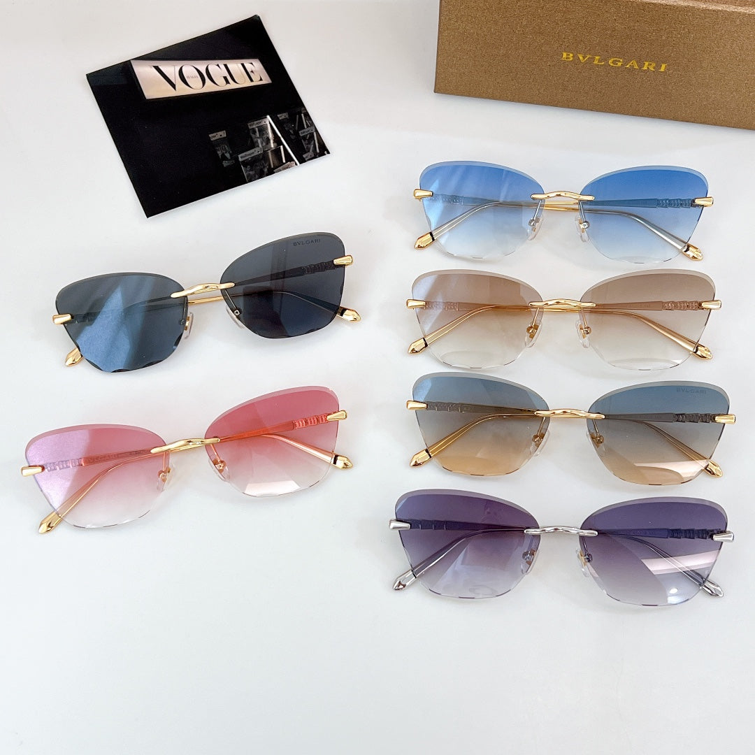 Bvlgari sunglasses set with multiple tinted lenses and gold-tone frames.
