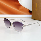 Bvlgari sunglasses with purple lenses and silver-tone metal frames.