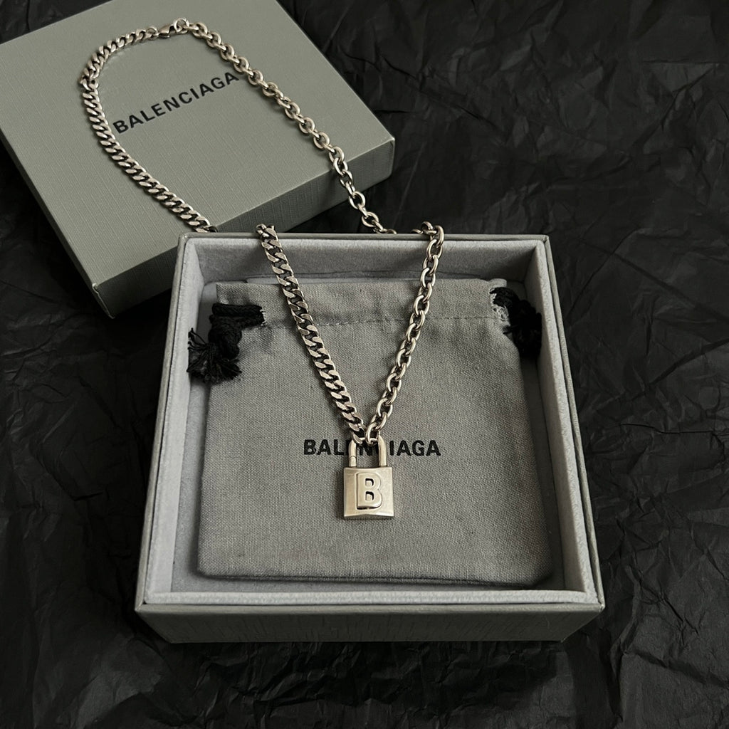 Silver chain necklace with square padlock pendant and B charm, in box