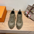 Hermes unisex sneakers in olive canvas, lace-up with cushioned sole and perforated paneling