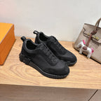 Hermes unisex sneakers, black lace-up pair with padded tongue and chunky tread sole