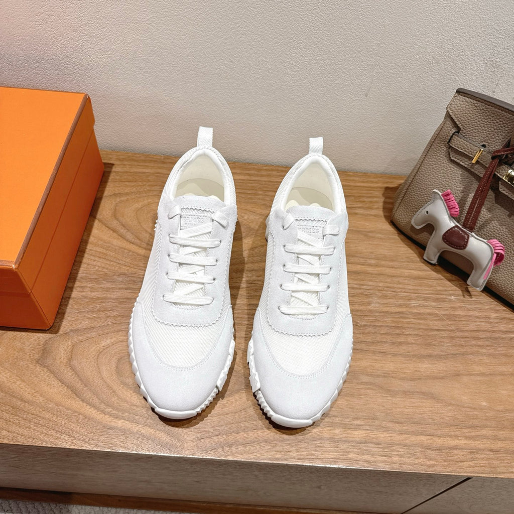 Hermes white unisex sneakers, front view, lace-up with textured rubber sole