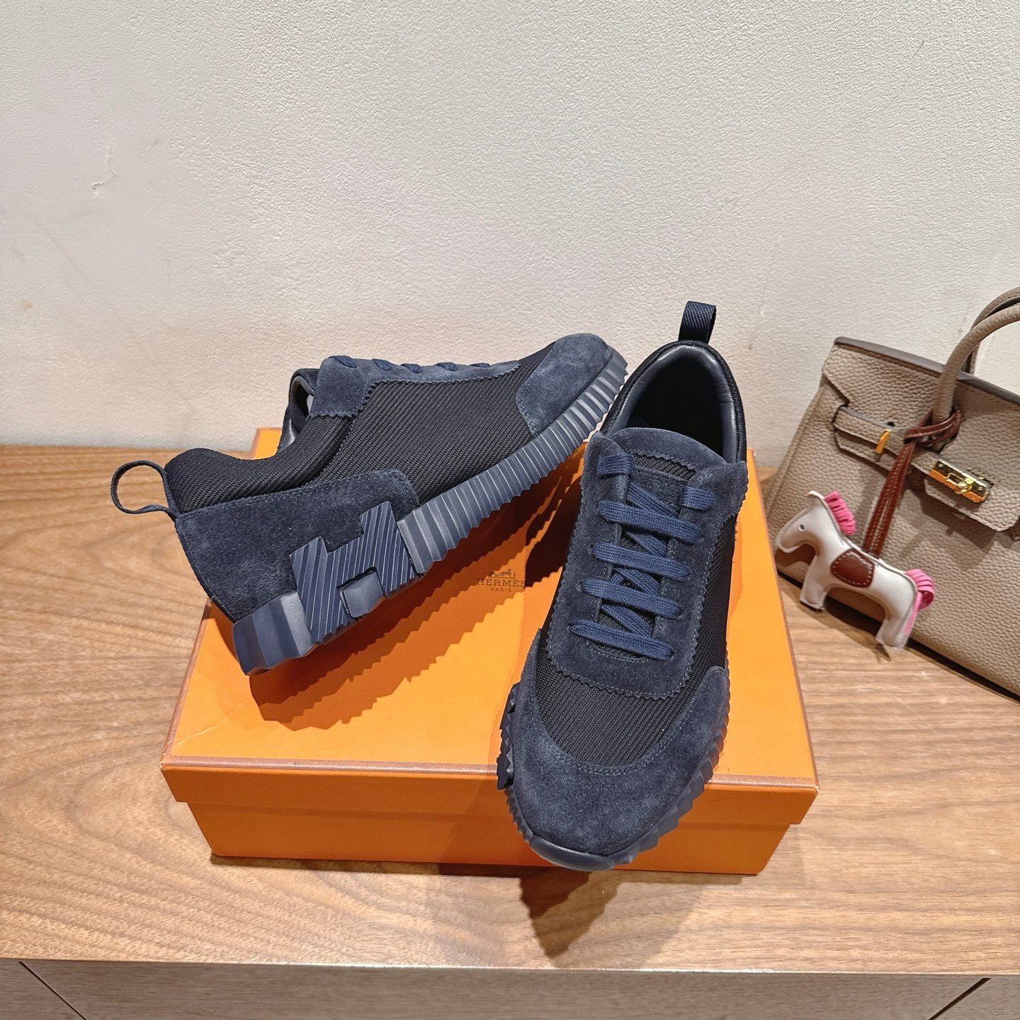 Hermes unisex suede sneakers in dark blue, lace-up with chunky contrast-pattern sole