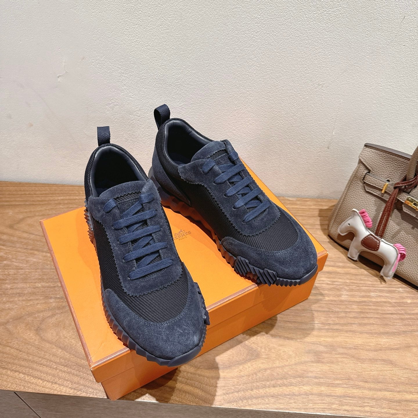 Hermes unisex suede sneakers, dark blue lace-up with side panel stitching and sole