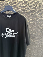 Black short-sleeve T-shirt with white Dior “for my real friends” graphic on front