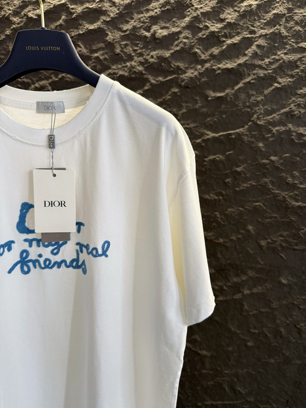 White short-sleeve T-shirt with blue Dior “for my real friends” logo graphic, crew neck