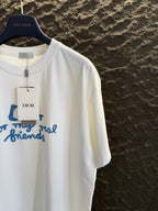 White short-sleeve T-shirt with blue Dior “for my real friends” logo graphic, crew neck
