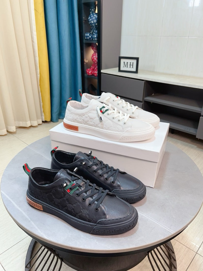 Versace sneakers set with white and dark leather uppers, lace-up, logo accents