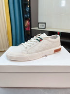 Versace low-top sneakers in white with lace-up front and side logo detail