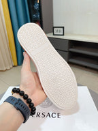 Versace white sneakers outsole view with textured traction pattern