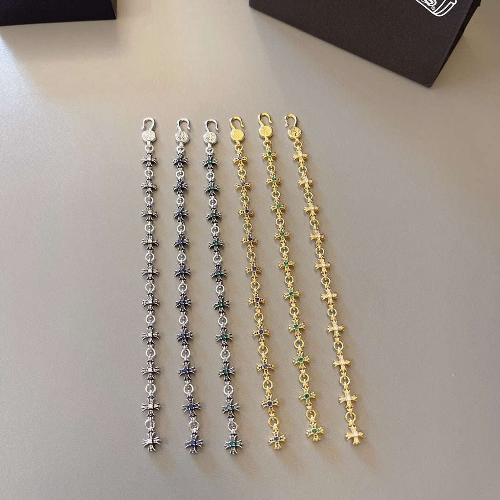 Multi-color charm bracelet set with silver, gold, and blue-green star links
