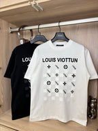 White crewneck T-shirt with “LOUIS VIOTTVN” graphic and icons on chest